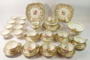 A Rockingham tea service comprising eight tea cups, eight coffee cups, eight saucers, slop bowl,