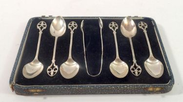 A set of six EPNS teaspoons and tongs with pierced terminals