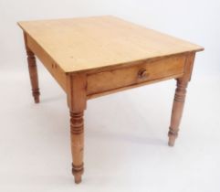 A Victorian pine kitchen dining table on turned supports with drawer, 112 x 85 x 73cm tall