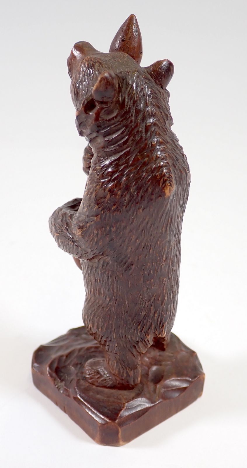 A Black Forrest carved wood bear with club, 12cm tall - Image 2 of 3