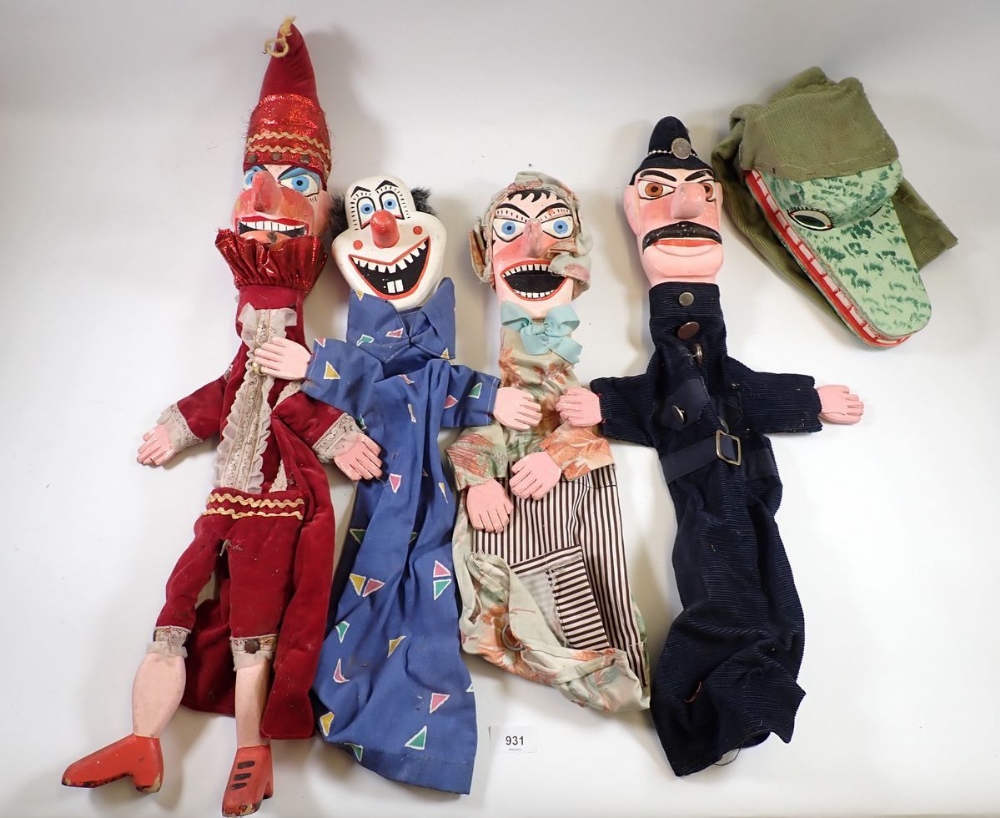 A vintage set of five large painted wood Punch & Judy hand puppets