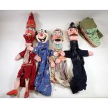 A vintage set of five large painted wood Punch & Judy hand puppets