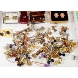 A group of gentleman's cufflinks, tie clips etc.