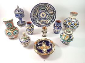 A group of Moroccan tin glazed pottery vases and dishes (10)