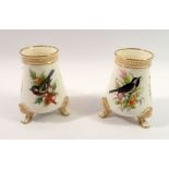 A pair of Royal Worcester vases painted birds in sprays of flowers and berries, by John Hopewell