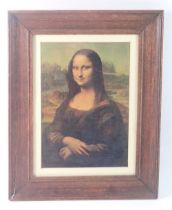 A canvas reproduction of the Mona Lisa, 25 x 17.5cm - frame a/f