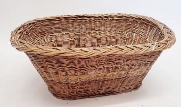 A vintage wicker laundry basket, 60cm