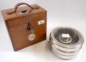 A Toulet Imperator pigeon clock in wooden case, 21cm tall