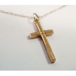 A 9 carat gold crucifix and chain, 1.3g