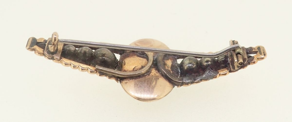 A Georgian gold and paste mourning brooch inset urn of flowers, unmarked but tested as 15 carat - Image 3 of 3