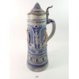 A German stoneware large beer stein, 36cm tall