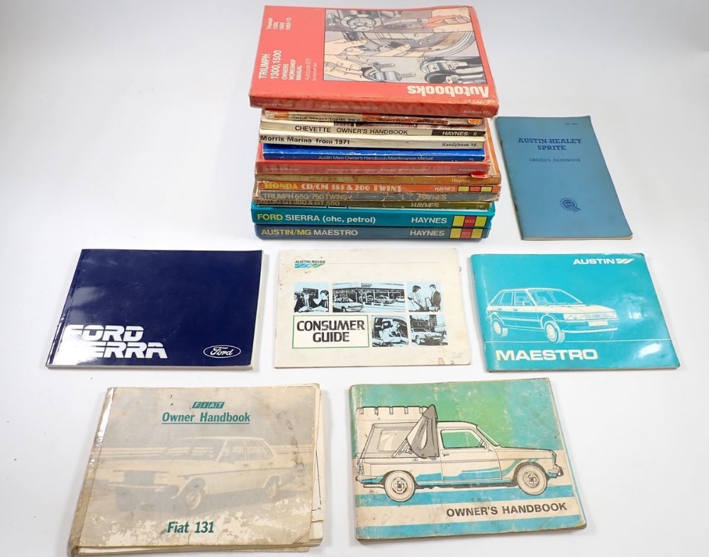 A box of Haynes manuals, an Austin Healey Sprite handbook 1958 etc.