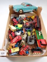A box of die cast cars and other model cars