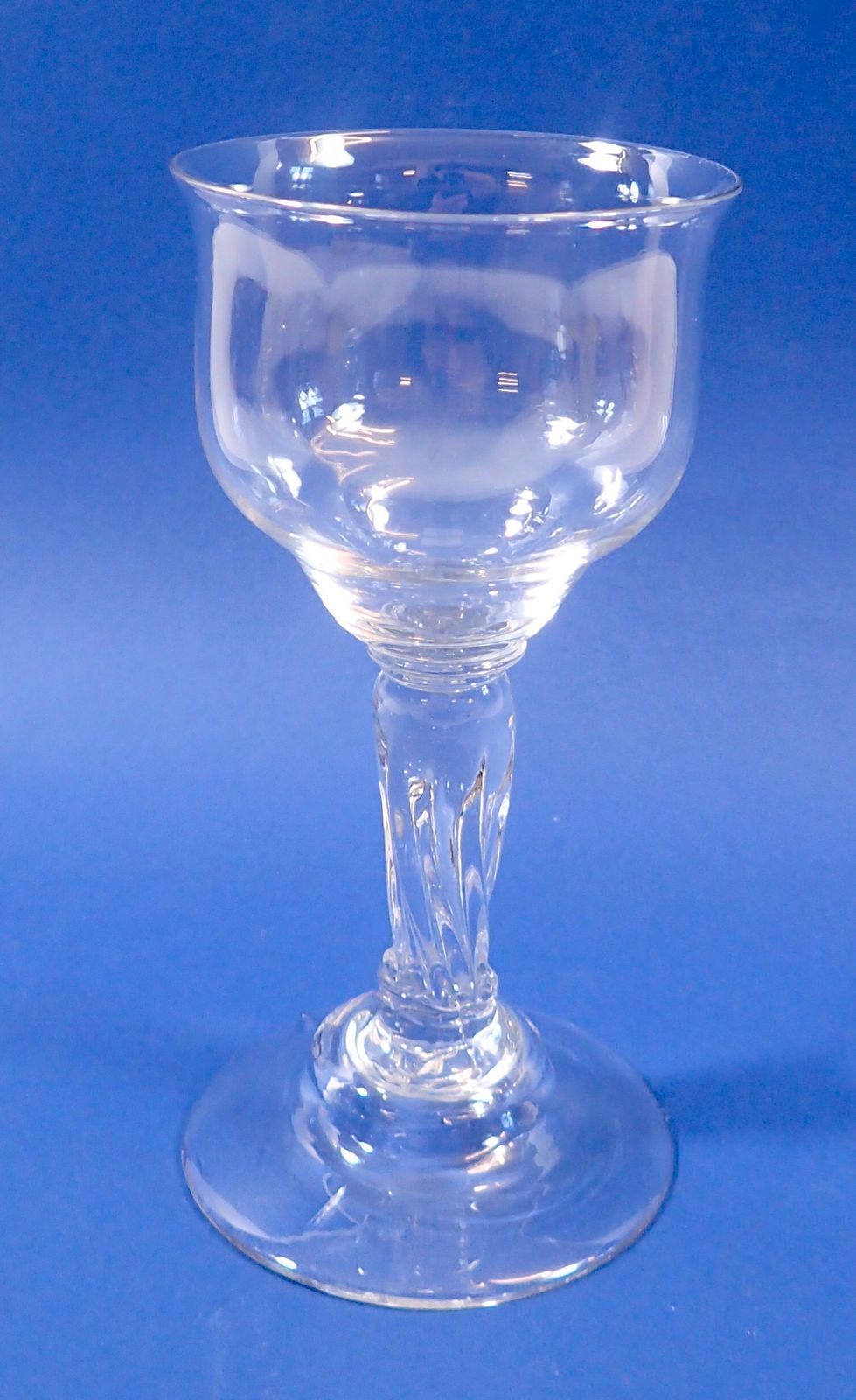 An 18th century large drinking glass with domed foot and silesian stem circa 1740/50, 18cm tall