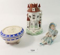 A Victorian bisque figure of a girl, a bisque powder pot decorated angels and a porcelain castle