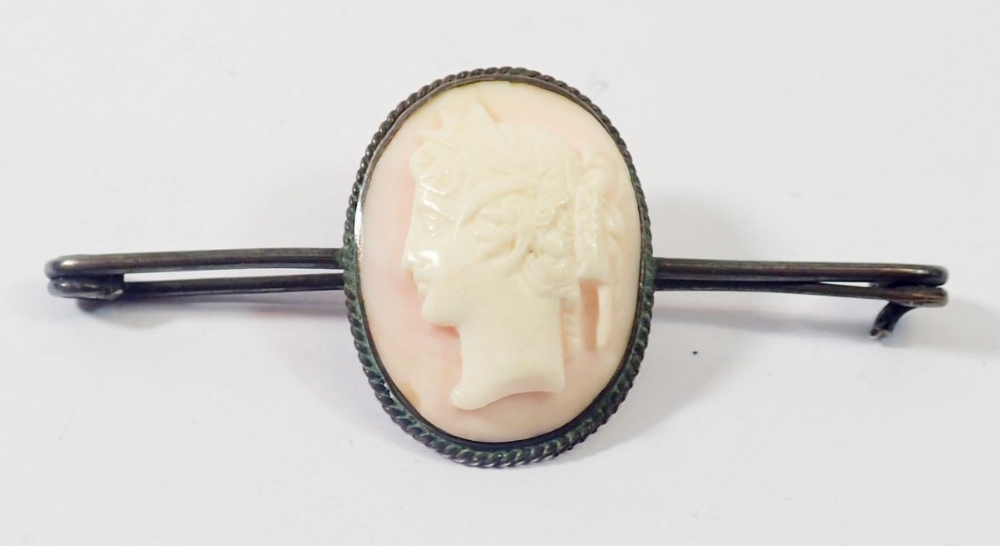 A 19th century white metal mounted pink cameo brooch, 7.5cm