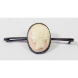 A 19th century white metal mounted pink cameo brooch, 7.5cm