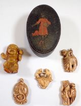 Five carved bone netsuke and an oval lacquer box decorated seed sower in red dress, 8 x 5.5cm