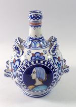 An Italian Faenza ceramic vase with painted portrait and ribbon decoration, 18.5cm high