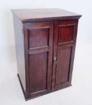 A stained wood cabinet with interior filing shelves, 80 x 54 x 43cm