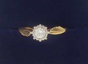 An 18 carat gold illusion set diamond ring, size M, 2.7g