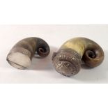 Two white metal mounted horn snuff mulls, largest 8cm tall