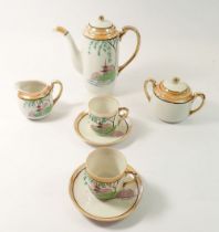 A Japanese eggshell coffee set comprising coffee pot, milk, sugar and two cups and saucers