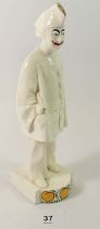 An early Copenhagen white pottery delft figure of Poirot clown, 23cm tall - a/f