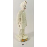 An early Copenhagen white pottery delft figure of Poirot clown, 23cm tall - a/f