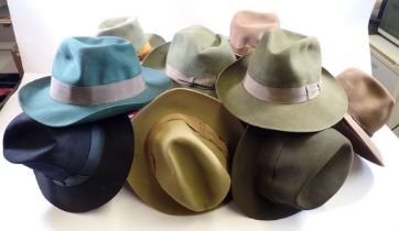 A box of various hats including a Herbert Johnson Indiana Jones style example etc.