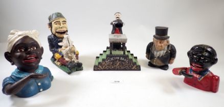 A group of five Victorian style cast iron money boxes including 'Magician Bank' and other characters