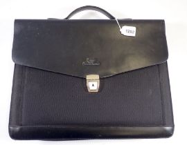 A Giorgio Armani briefcase plus an unused filofax style wallet