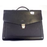 A Giorgio Armani briefcase plus an unused filofax style wallet