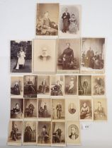 A small collection of Victorian photographs and carte de visites including cyclist