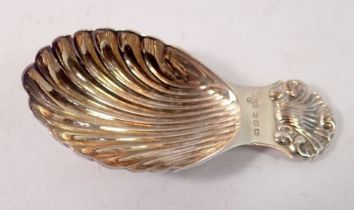 A silver caddy spoon with shell terminal, London 1966 by A Chick & Sons Ltd. 20g
