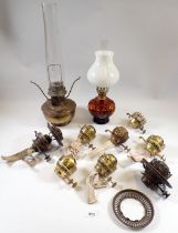A box containing an Aladdin oil lamp, five various Duplex lamp burners, a No.2 Hinks Lever burner