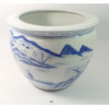 A Chinese blue and white jardiniere painted landscapes 24cm tall