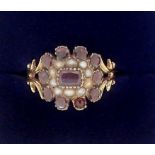 A Victorian 9 carat gold garnet and seed pearl ring, size J, 2.9g, boxed