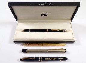 A Mont Blanc ballpoint pen, boxed and three various fountain pens including a gold plated Parker