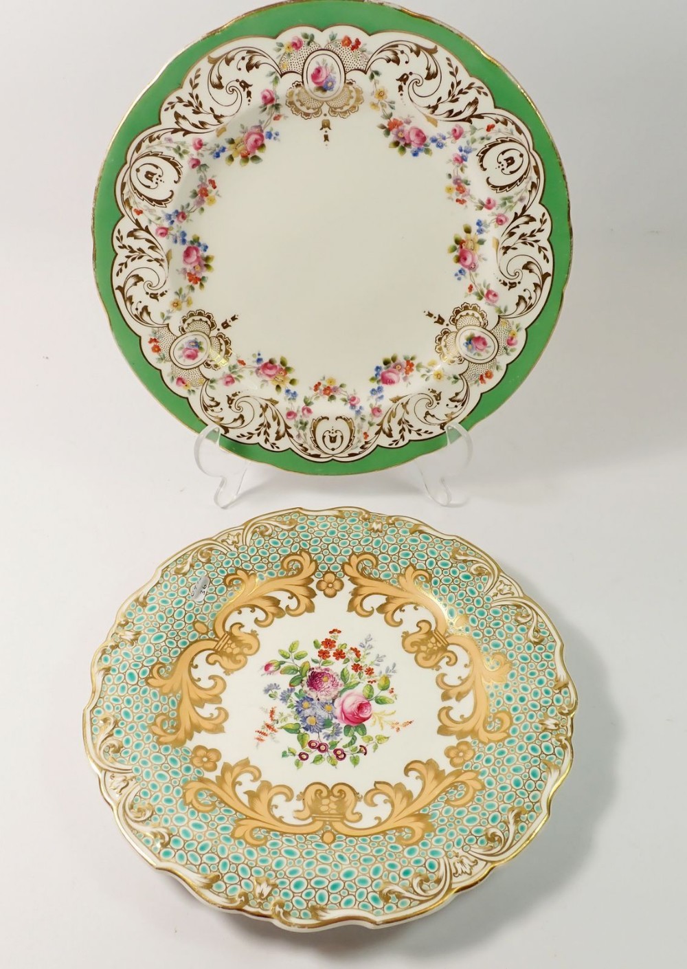 A Minton plate painted floral swags within green and gilt borders, 24cm diameter and a Victorian