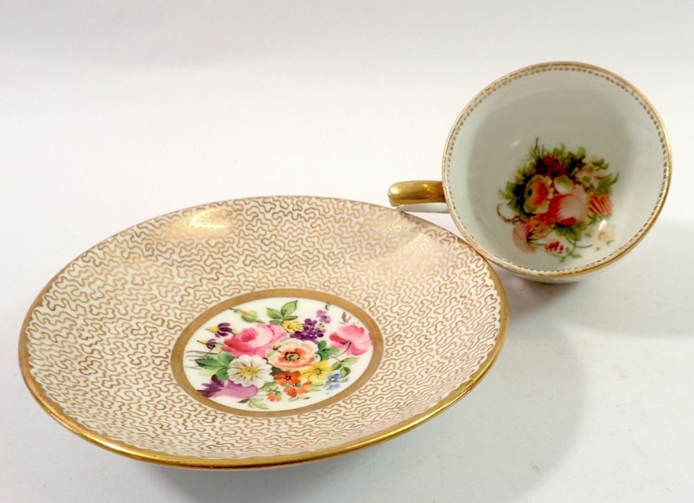 A Victorian set of four cups and saucers painted flowers to interior and with all over gilt exterior - Image 2 of 2