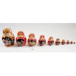 A Russian Matryoshka doll by Sergiev Posad comprising ten dolls telling a fairy tale story