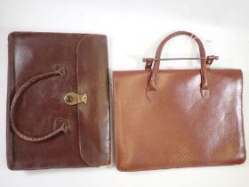 Two vintage leather music cases