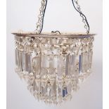 An early 20th century three tier waterfall chandelier, with triple light fitting in chrome, 36cm