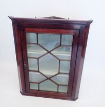 A Georgian mahogany astragal glazed corner cabinet, 81cm wide