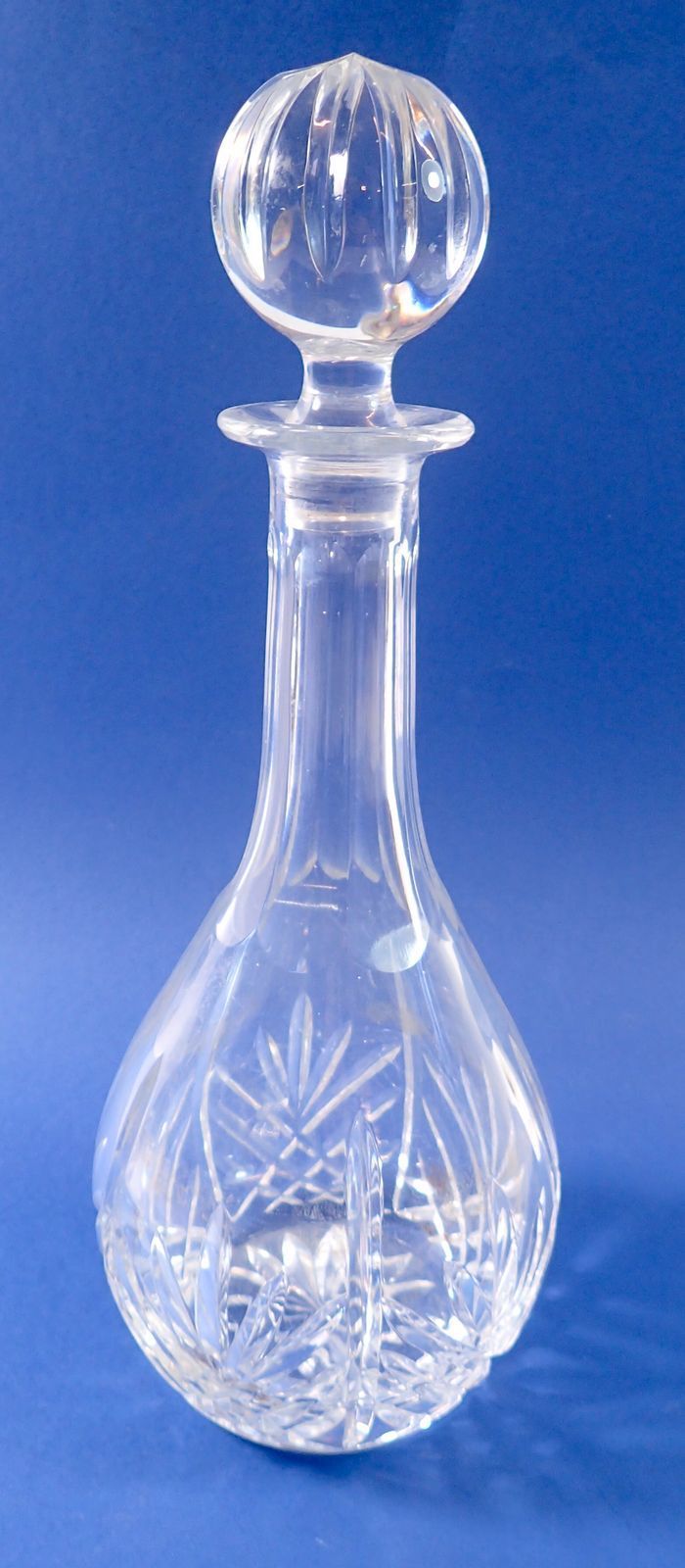 A cut glass spirit decanter, 33cm tall