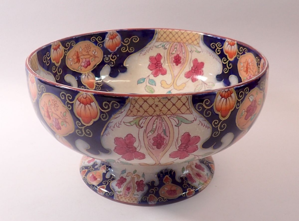 A Thomas Shirley, Clyde Pottery large fruit bowl with floral decoration, 28cm diameter