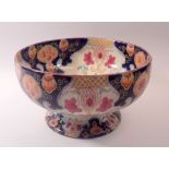 A Thomas Shirley, Clyde Pottery large fruit bowl with floral decoration, 28cm diameter