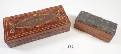 An Edwardian burr walnut stamp box with marquetry decoration 16cm wide and another pewter stamp