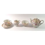 A floral painted bachelors teapot, cup and saucer, jug and sugar